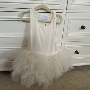 I love plum cream tutu size 6